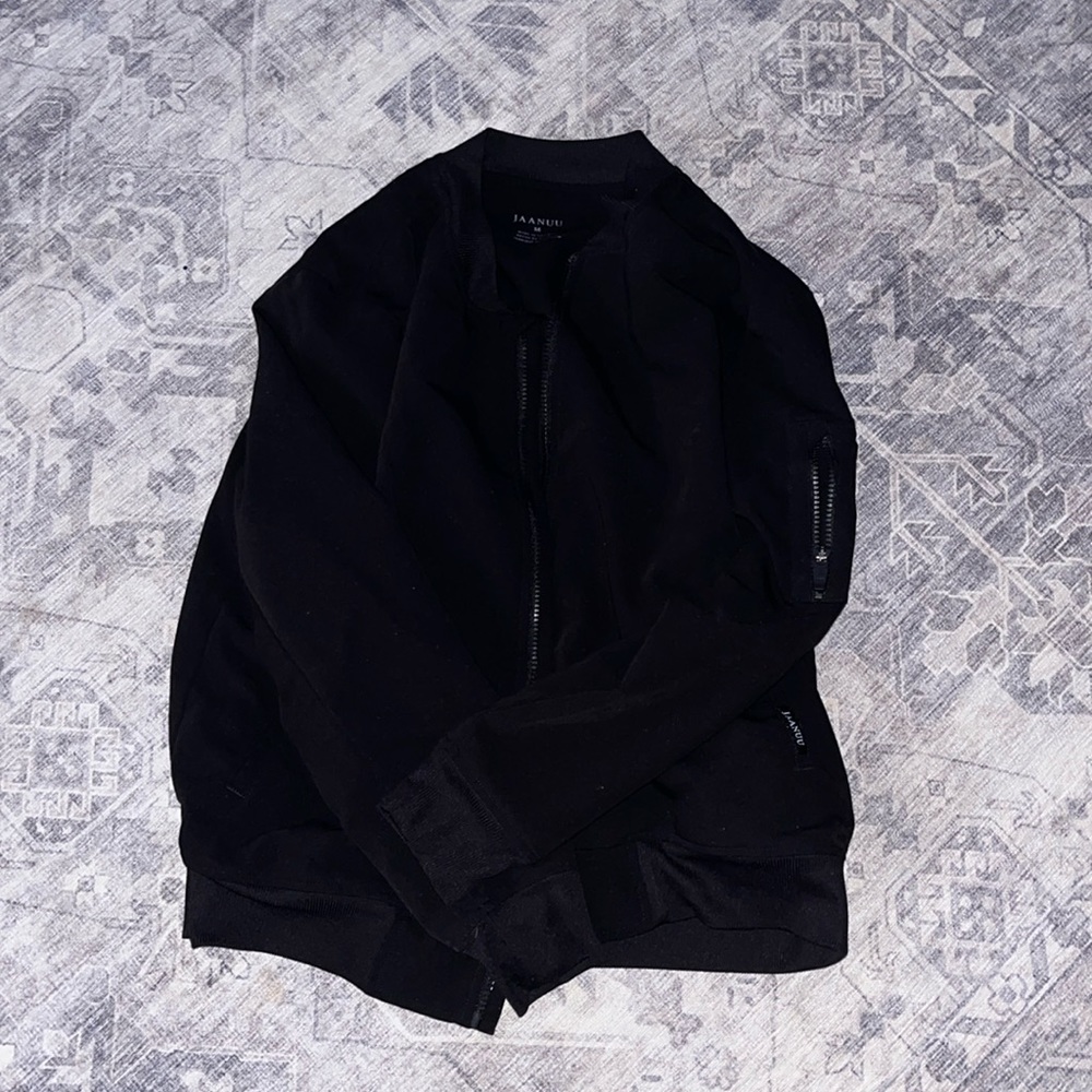 Medium 3 pocket black Jaanuu jacket.